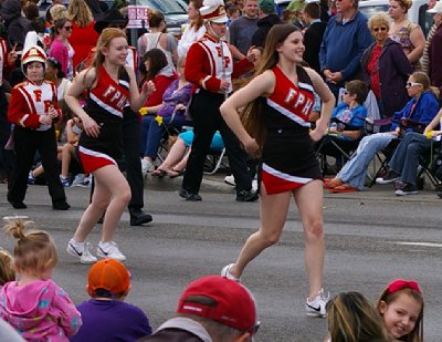 Caitlin and her fellow cheerleaders at the Daffodil Parade in Puyallup, Washington.