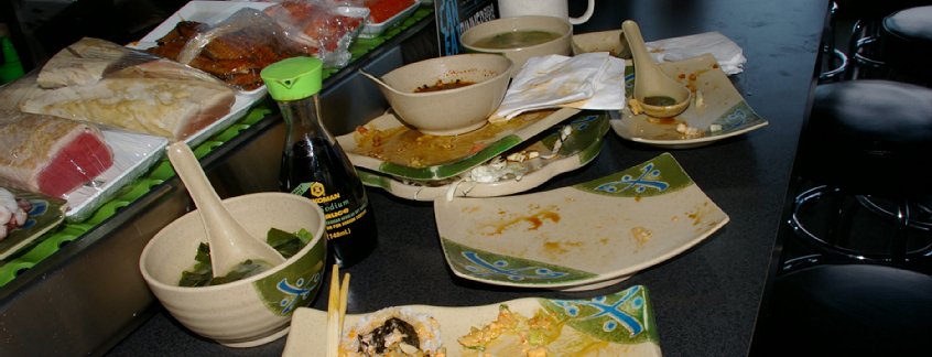 Left over plates and bowls from our excellent all-you-can-eat shushi dinner at Sushi Town/Trapper Sushi in Puyallup, Washington.